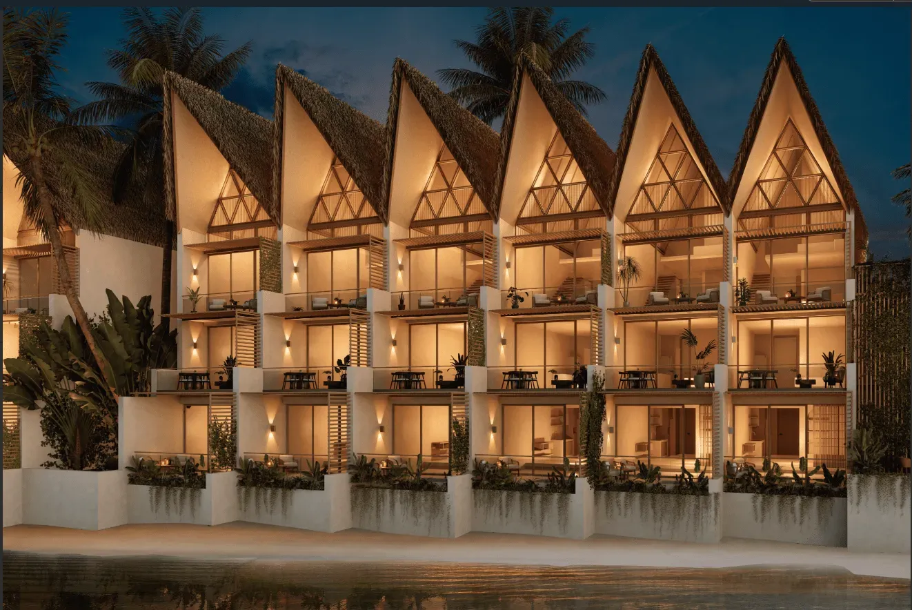 Hermosa fachada nocturna de Oasis Lake Punta Cana